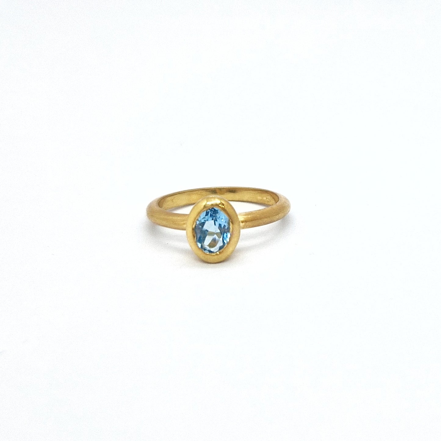 Anello con topazio azzurro in argento 925 dorato