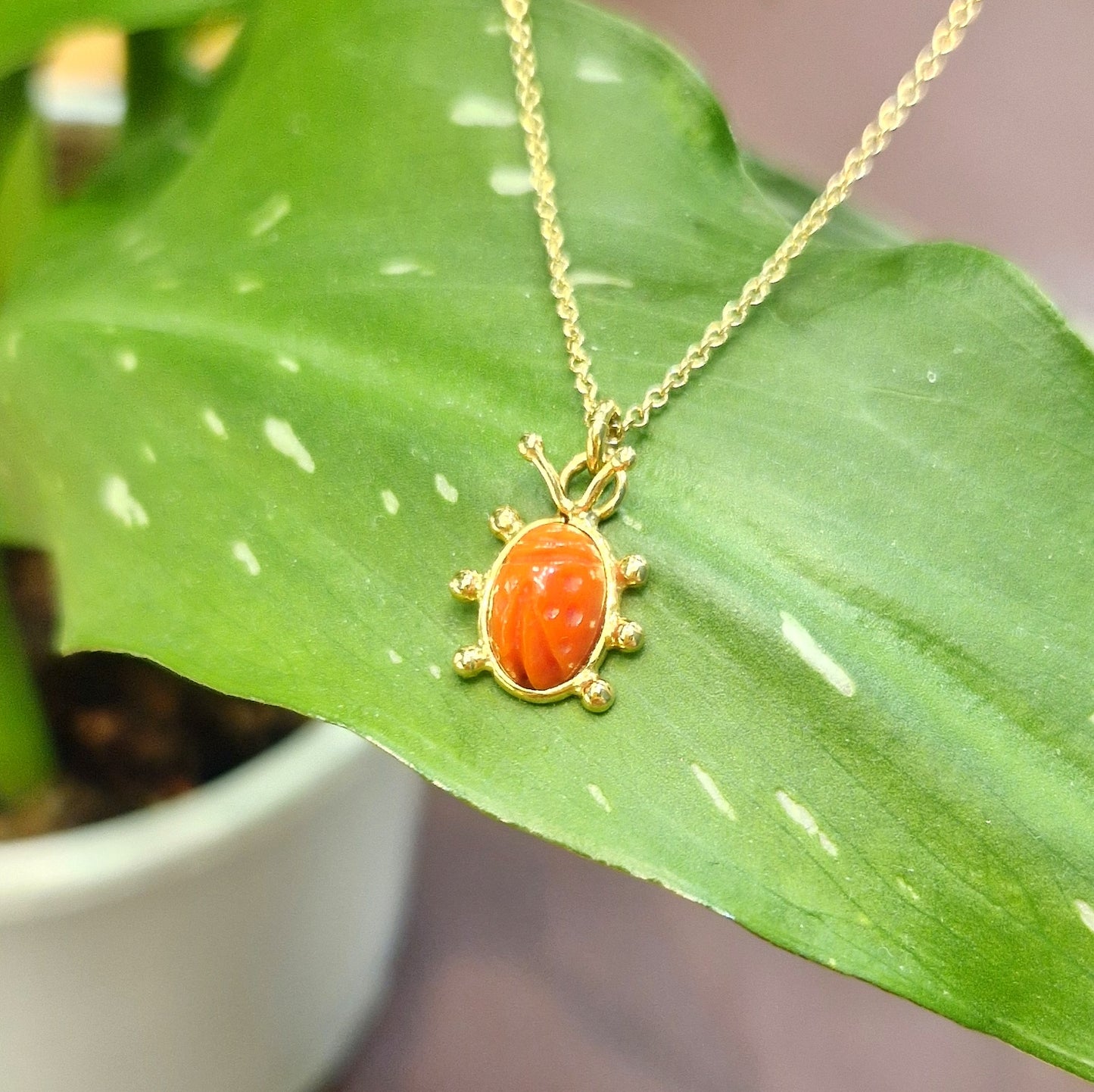Collana coccinella corallo in oro giallo 18 kt