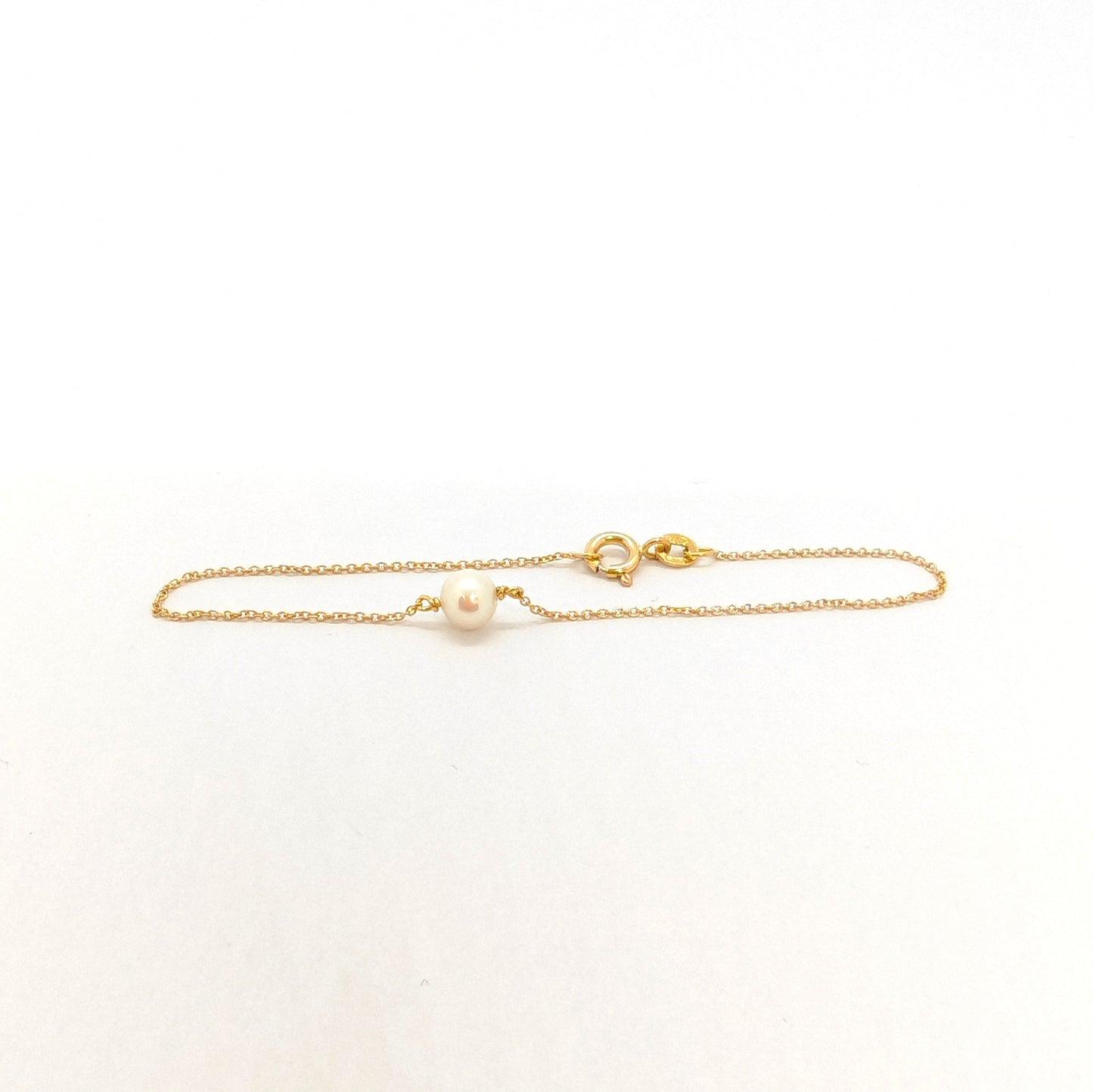 Bracciale in oro giallo 18 kt e perla