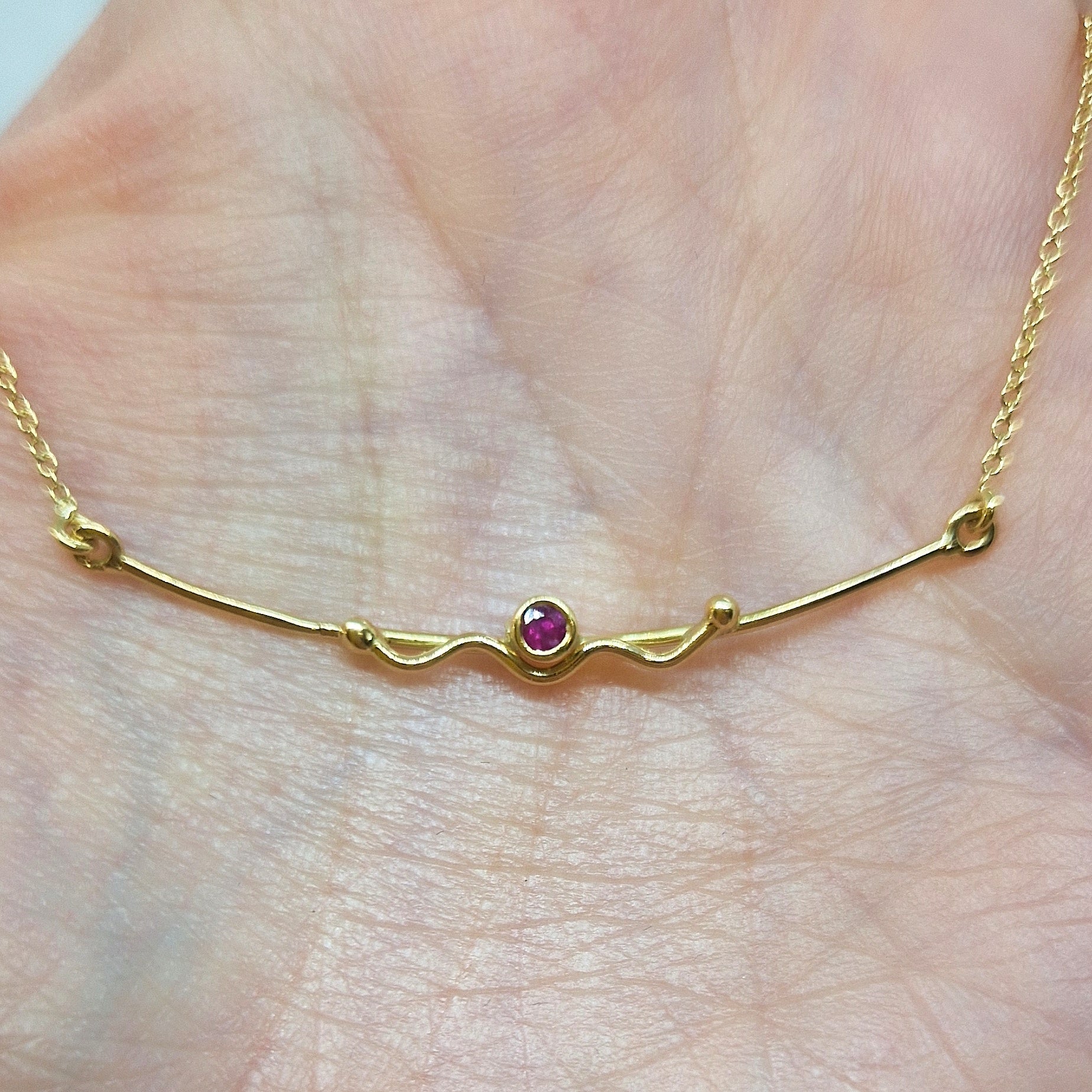 Collana con rubino in oro giallo 18 kt