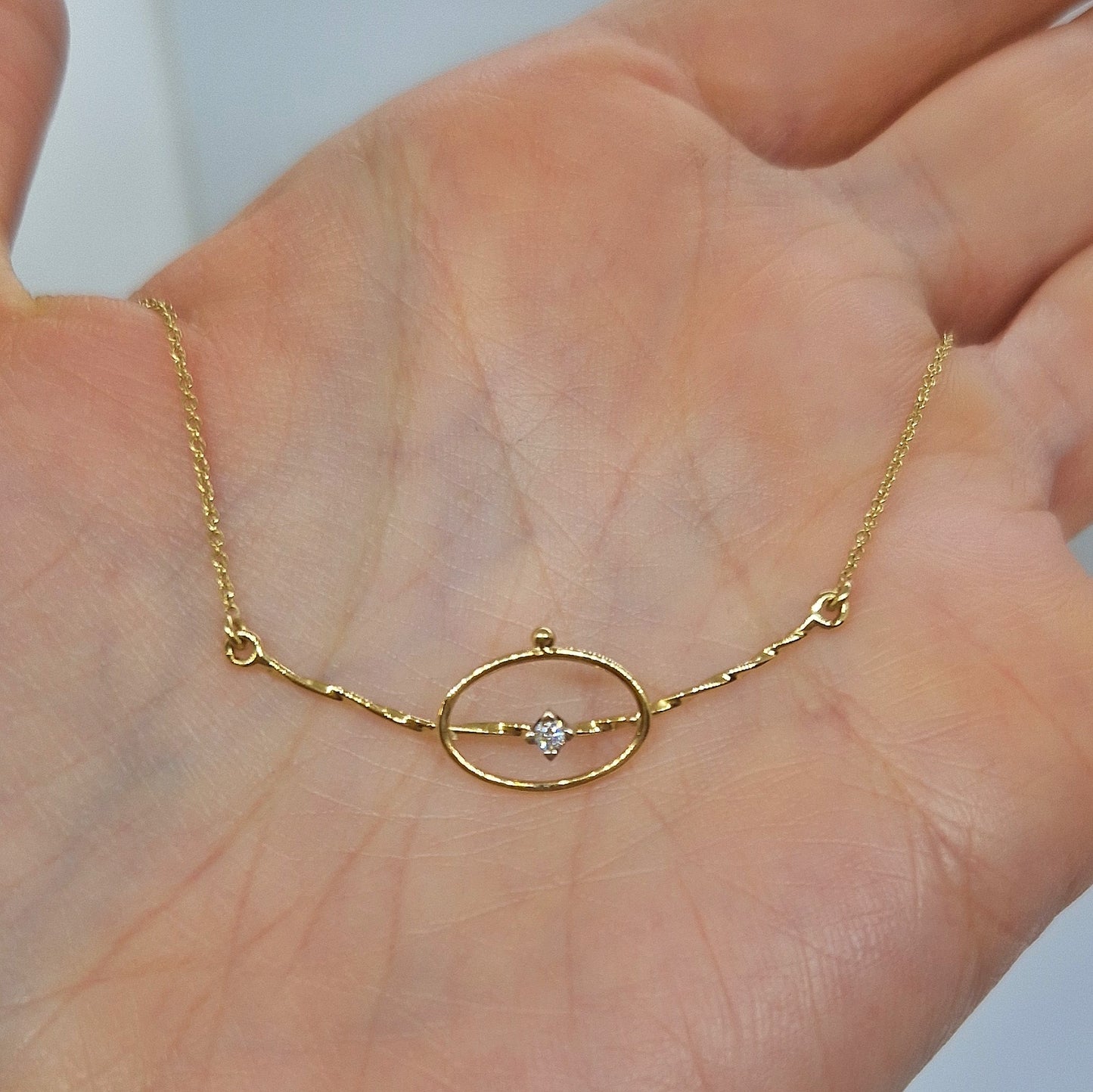 Collana con diamanti in oro giallo 18 kt