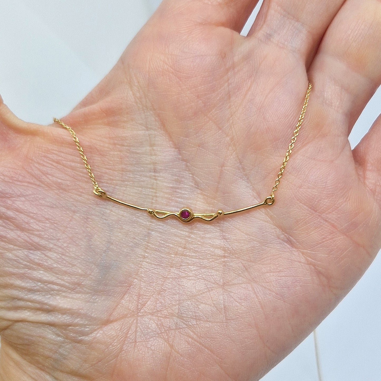 Collana con rubino in oro giallo 18 kt