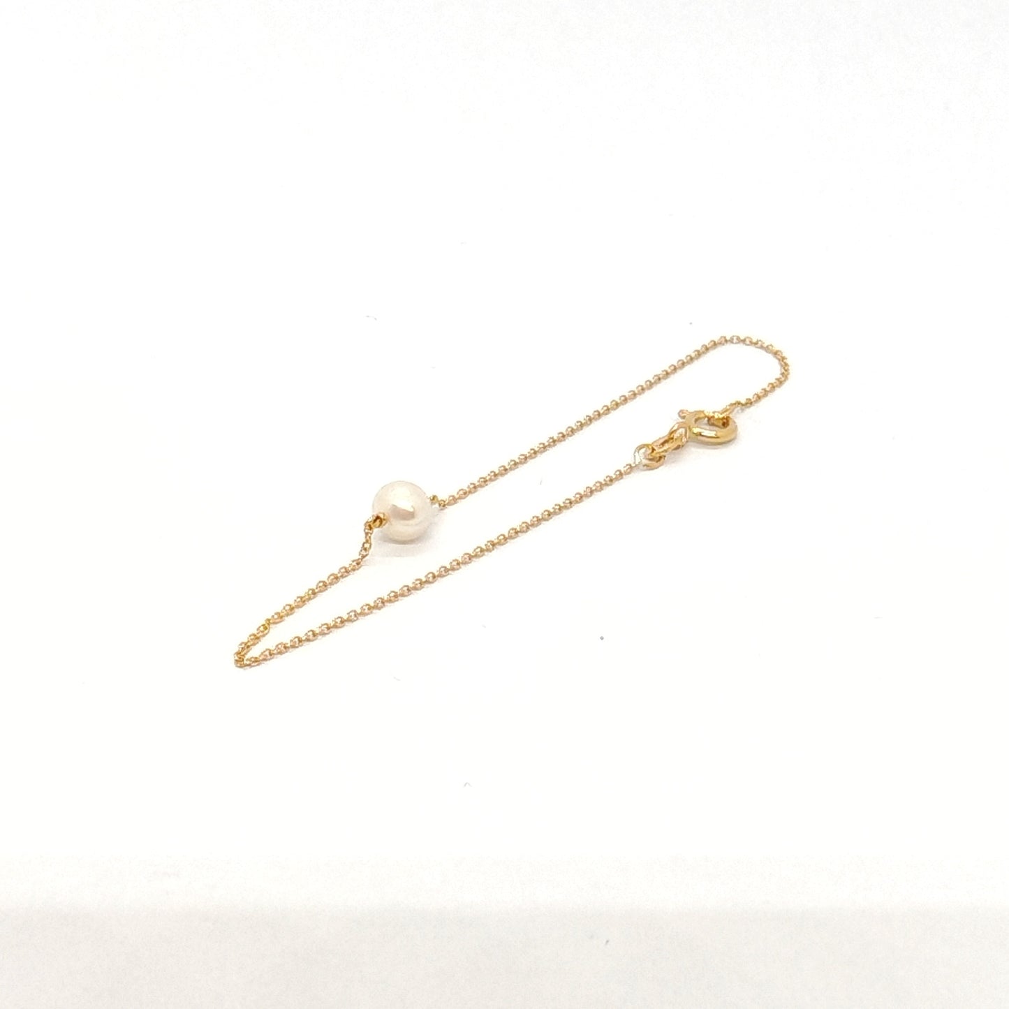 Bracciale in oro giallo 18 kt e perla