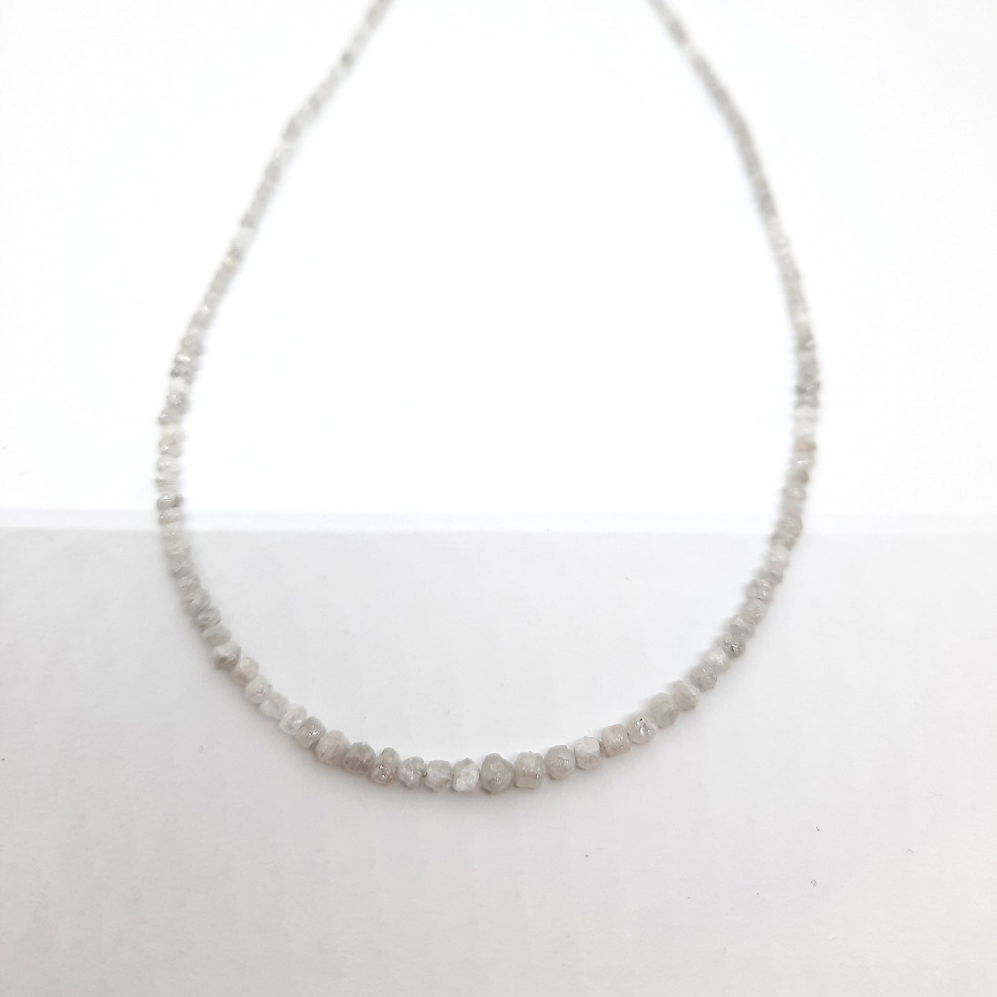 Filo di diamanti ice con chiusura in oro